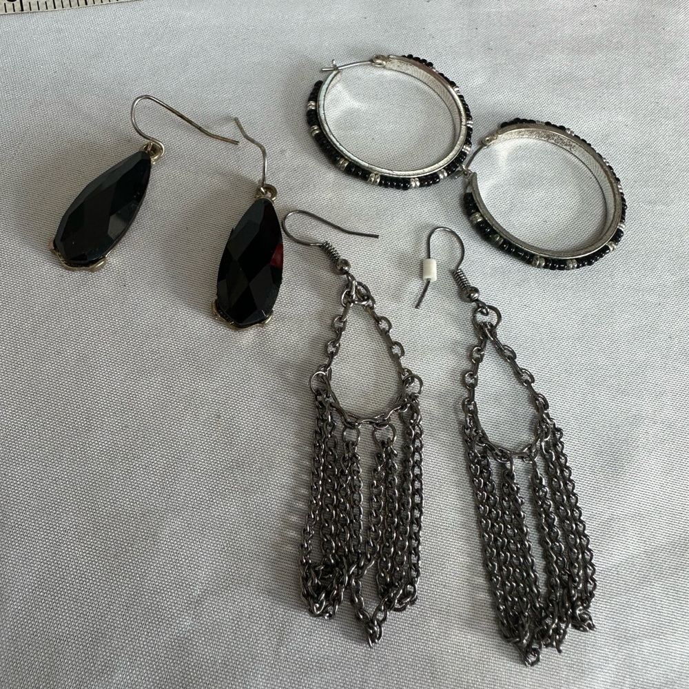 Three pair of black vibe earrings